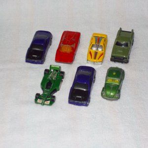 A set of seven cars, various brands.